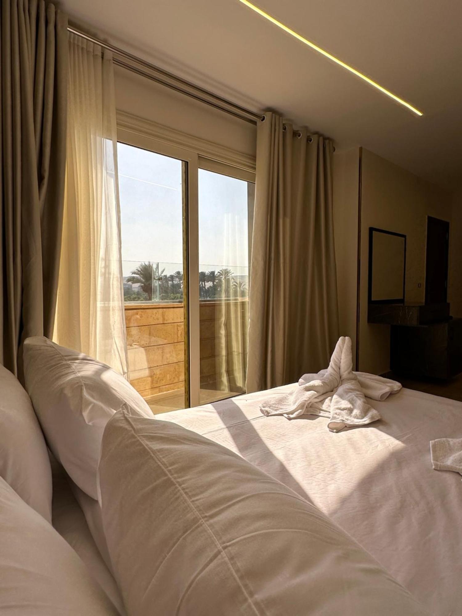 Taj Pyramids View Inn Kafret el-Gabal 外观 照片